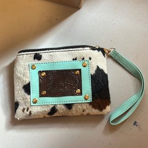 Cow hide clutch